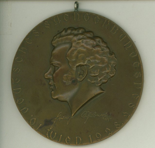 SCHUBERT CENTENNIAL - A medallion and a Commemorative Booklet